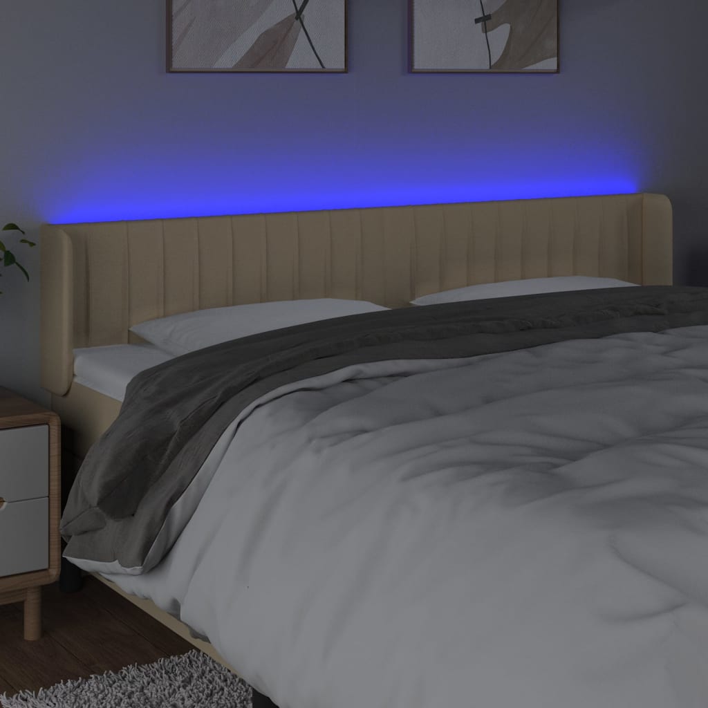 sengegavl med LED-lys 163x16x78/88 cm stof cremefarvet