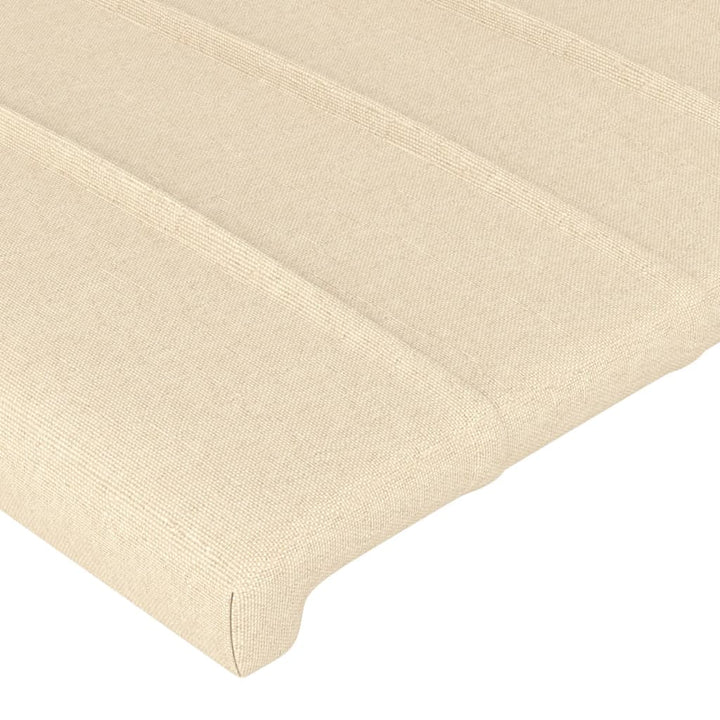 sengegavl med LED-lys 163x16x78/88 cm stof cremefarvet