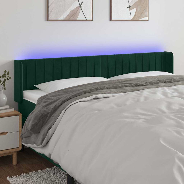sengegavl med LED-lys 203x16x78/88 cm fløjl mørkegrøn