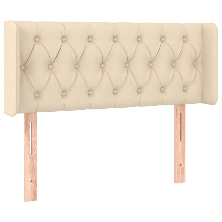 sengegavl med LED-lys 93x16x78/88 cm stof cremefarvet
