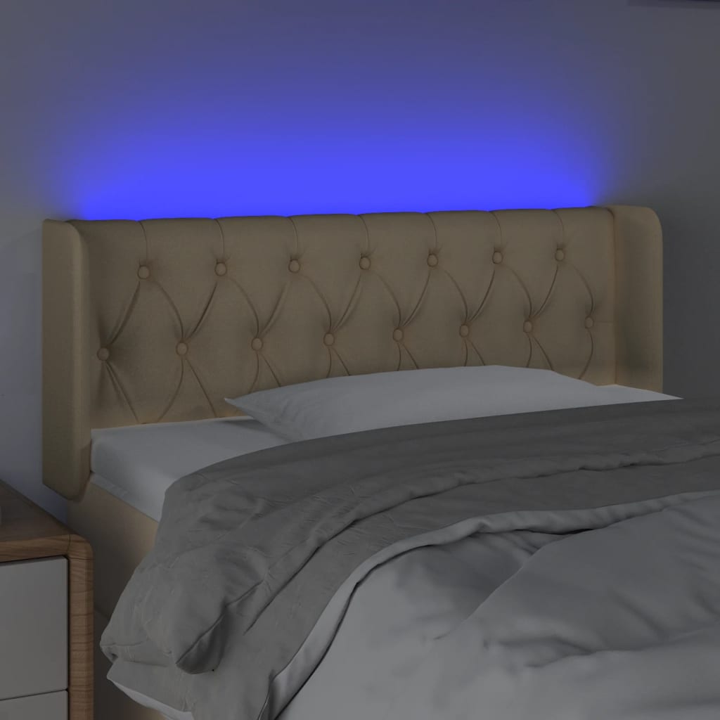 sengegavl med LED-lys 93x16x78/88 cm stof cremefarvet
