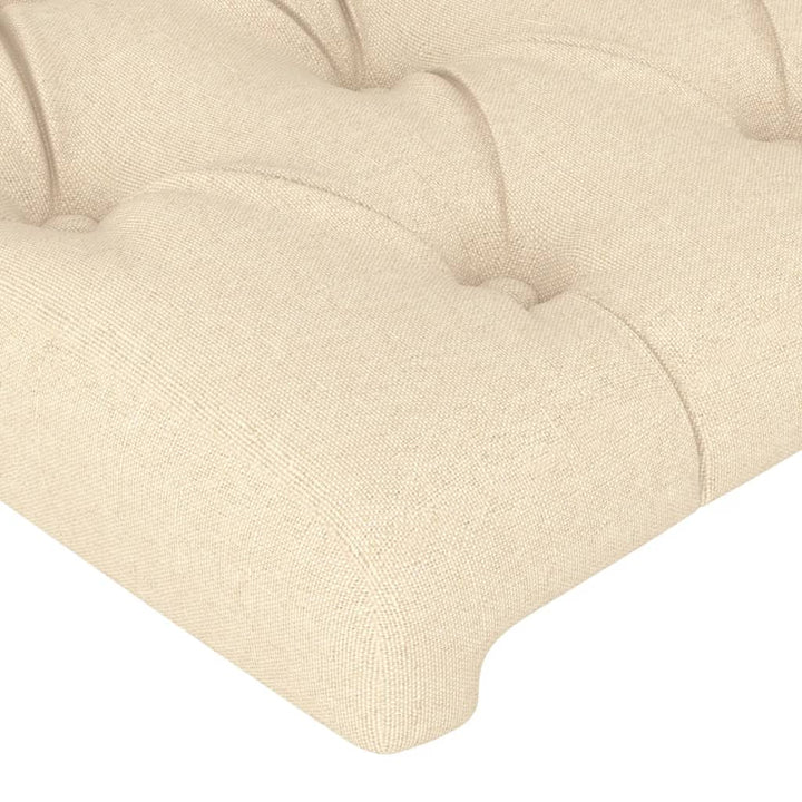 sengegavl med LED-lys 93x16x78/88 cm stof cremefarvet