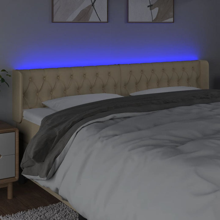 sengegavl med LED-lys 203x16x78/88 cm stof cremefarvet