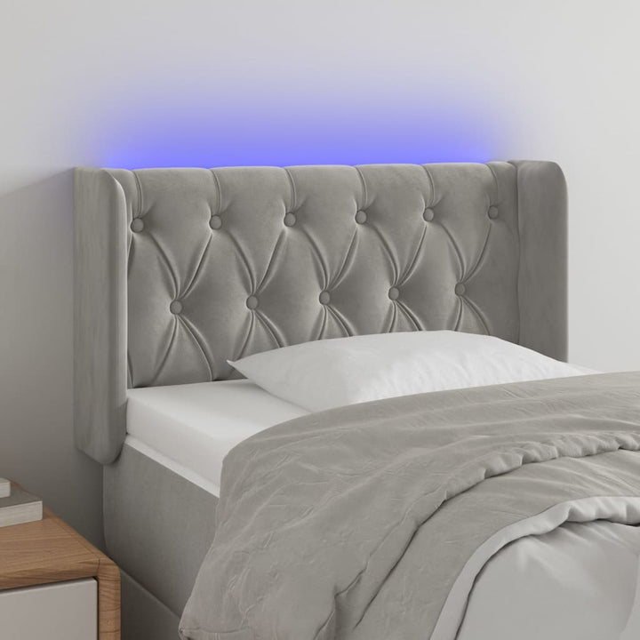 sengegavl med LED-lys 83x16x78/88 cm fløjl lysegrå