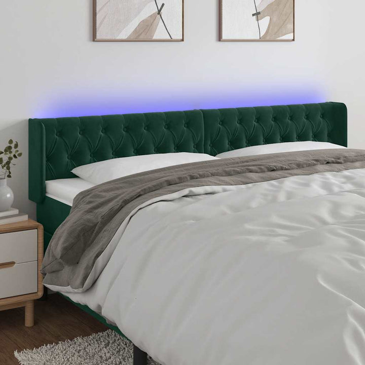 sengegavl med LED-lys 203x16x78/88 cm fløjl mørkegrøn