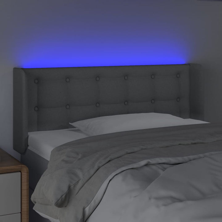 sengegavl med LED-lys 83x16x78/88 cm stof lysegrå