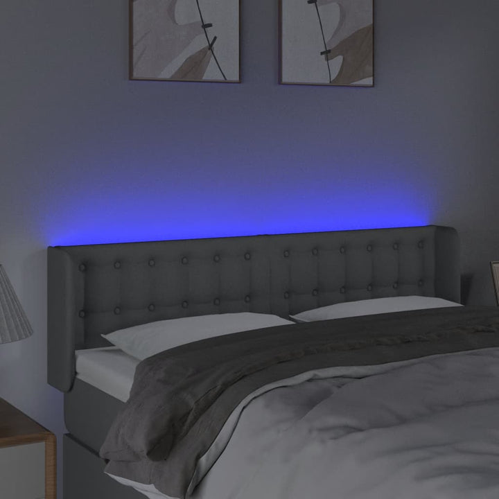 sengegavl med LED-lys 147x16x78/88 cm stof lysegrå