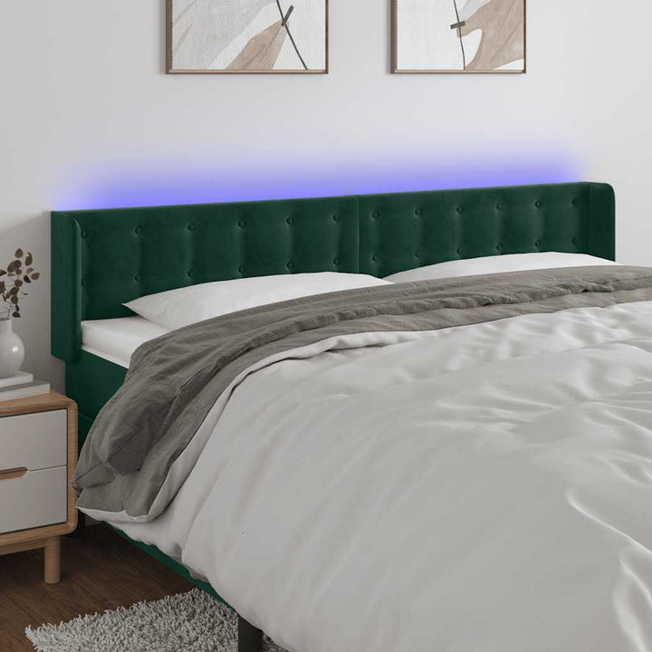 sengegavl med LED-lys 163x16x78/88 cm fløjl mørkegrøn