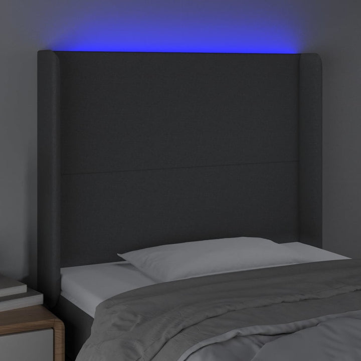 sengegavl med LED-lys 83x16x118/128 cm stof mørkegrå