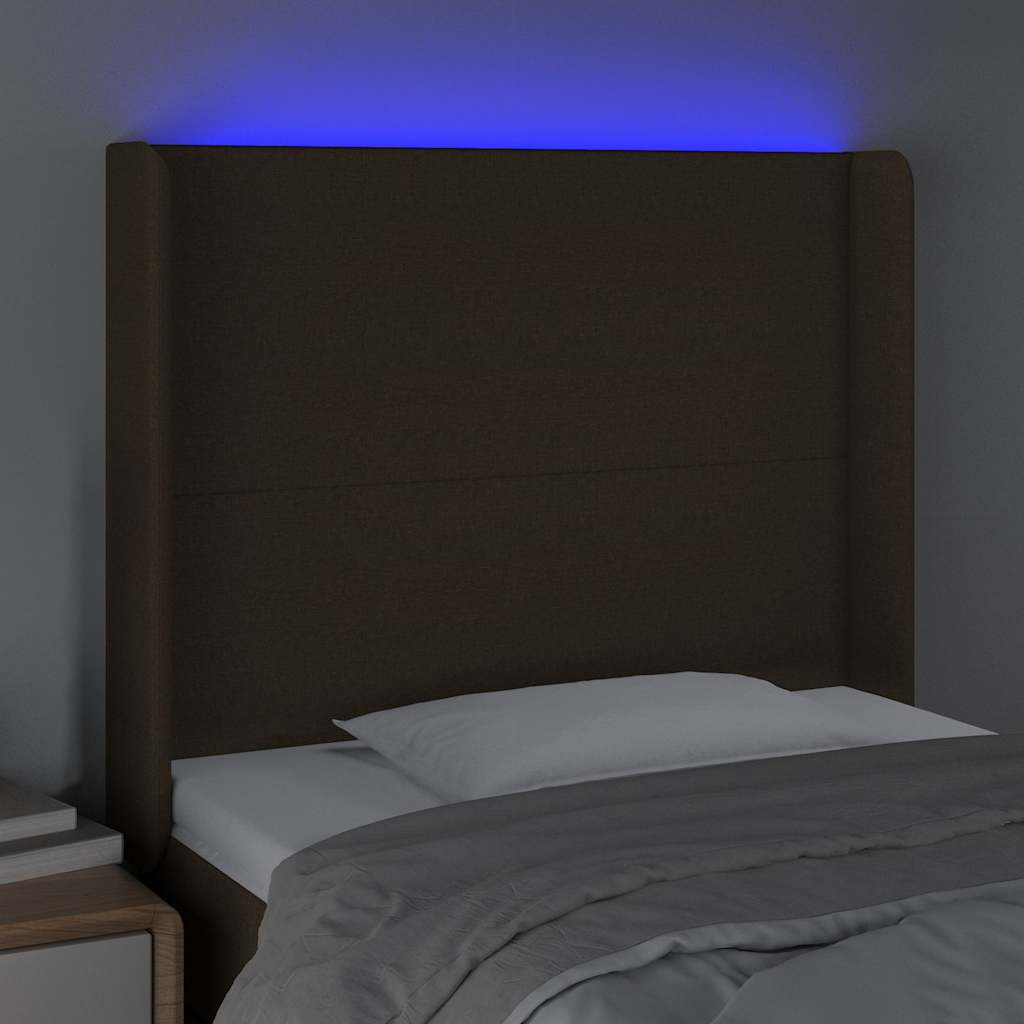 sengegavl med LED-lys 83x16x118/128 cm stof mørkebrun