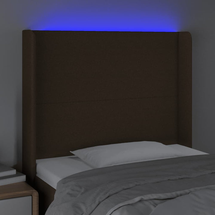 sengegavl med LED-lys 93x16x118/128 cm stof mørkebrun