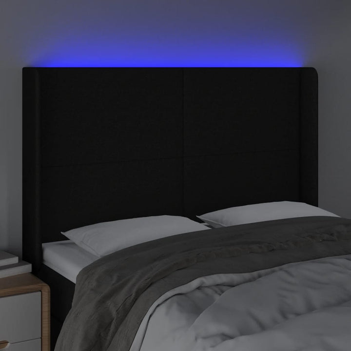 sengegavl med LED-lys 147x16x118/128 cm stof sort