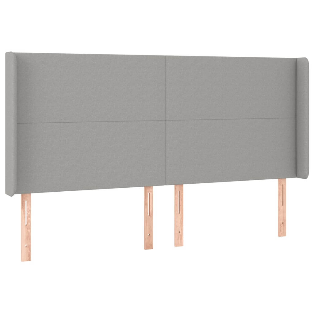 sengegavl med LED-lys 163x16x118/128 cm stof lysegrå