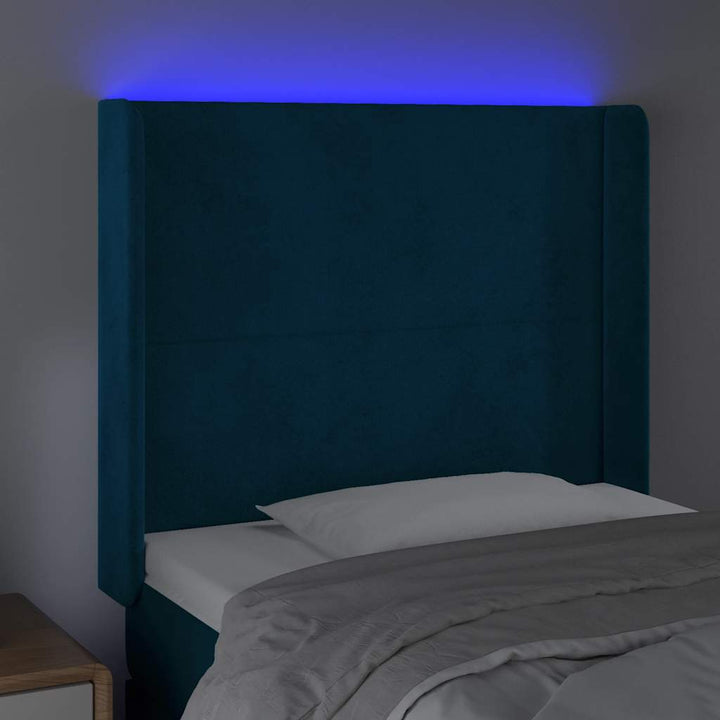 sengegavl med LED-lys 83x16x118/128 cm fløjl mørkeblå