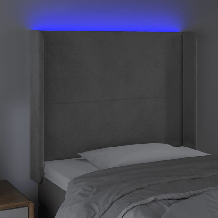 sengegavl med LED-lys 103x16x118/128 cm fløjl lysegrå