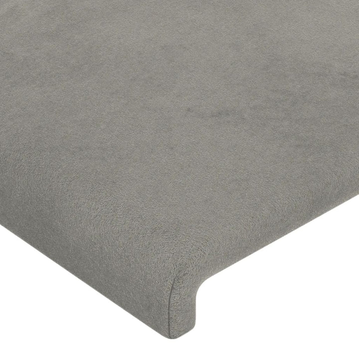 sengegavl med LED-lys 147x16x118/128 cm fløjl lysegrå