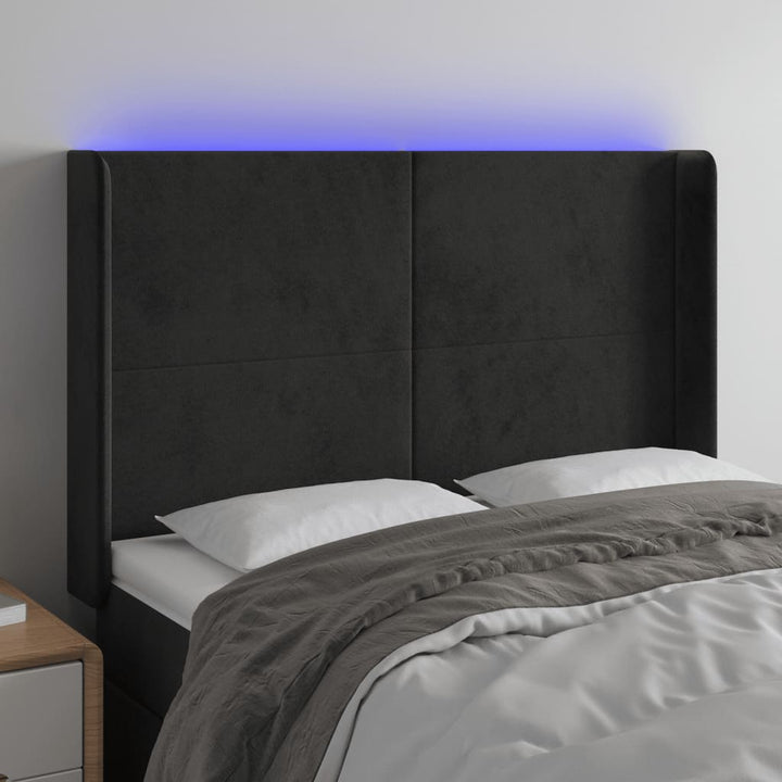 sengegavl med LED-lys 147x16x118/128 cm fløjl sort
