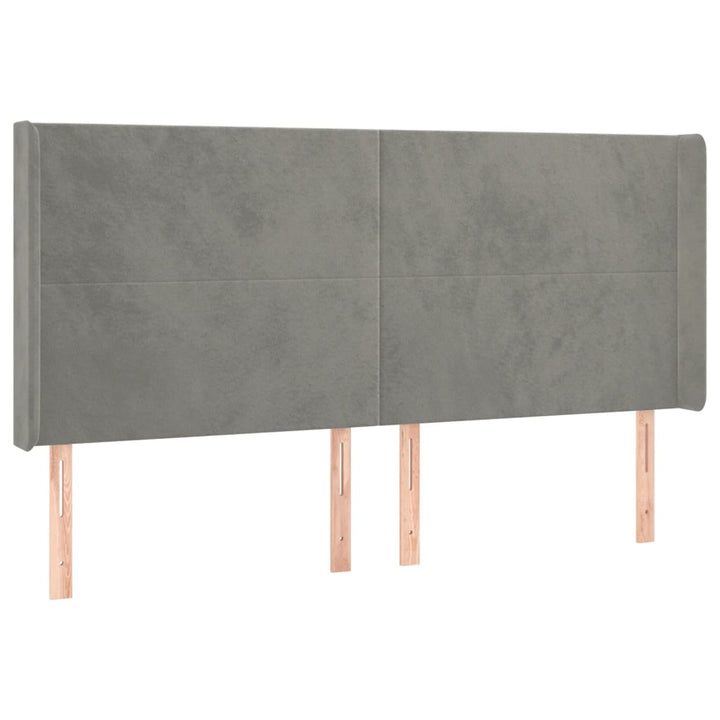 sengegavl med LED-lys 163x16x118/128 cm fløjl lysegrå