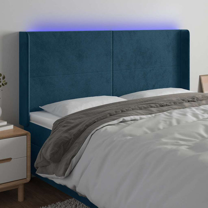 sengegavl med LED-lys 183x16x118/128 cm fløjl mørkeblå