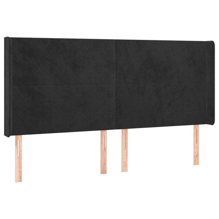sengegavl med LED-lys 203x16x118/128 cm fløjl sort
