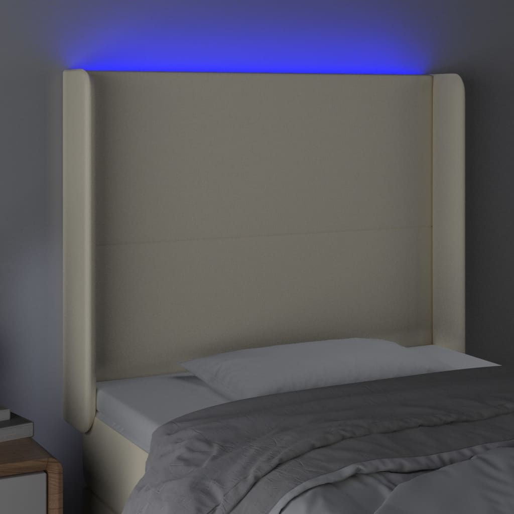 sengegavl med LED-lys 83x16x118/128 cm kunstlæder cremefarvet