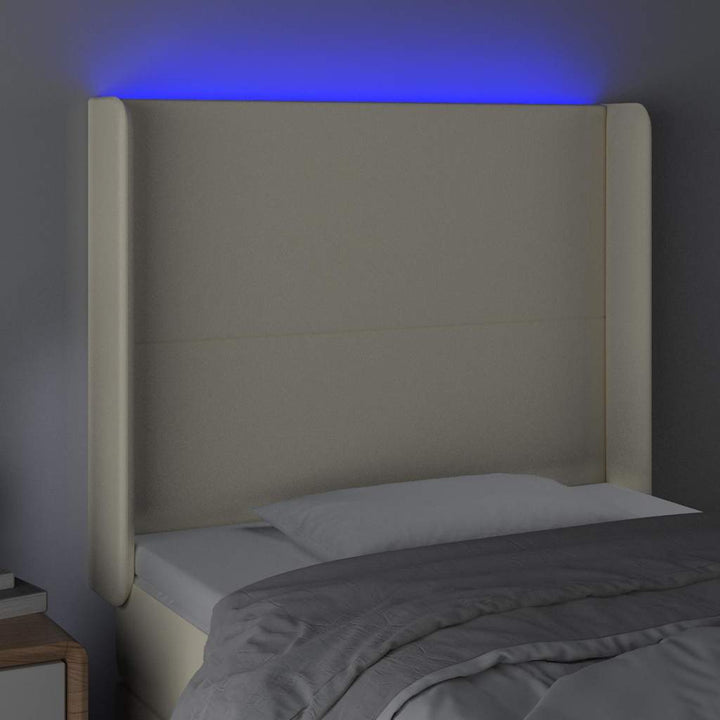 sengegavl med LED-lys 103x16x118/128 cm kunstlæder cremefarvet