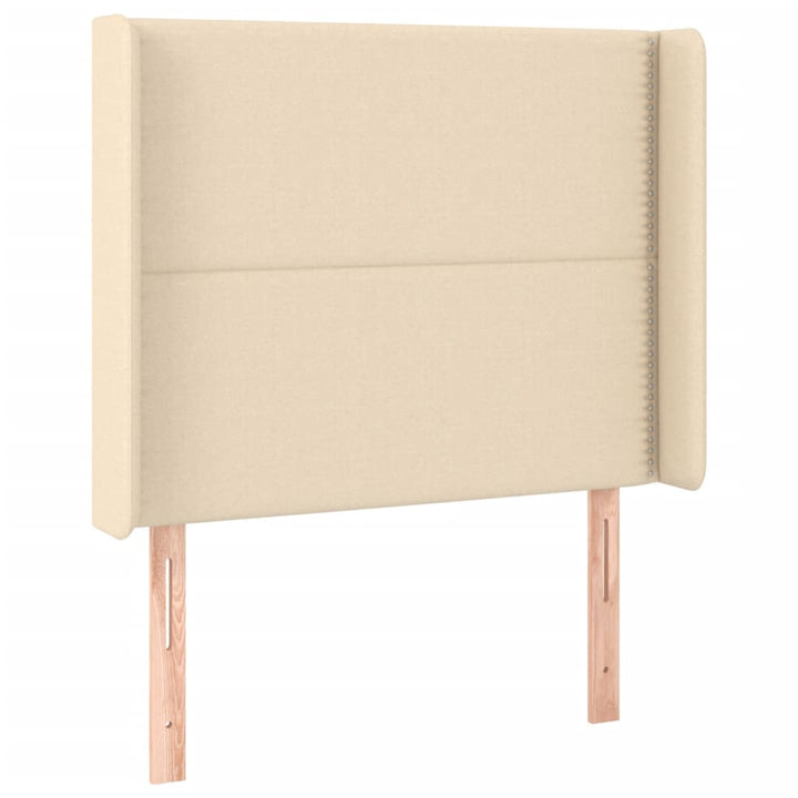 sengegavl med LED-lys 93x16x118/128 cm stof cremefarvet