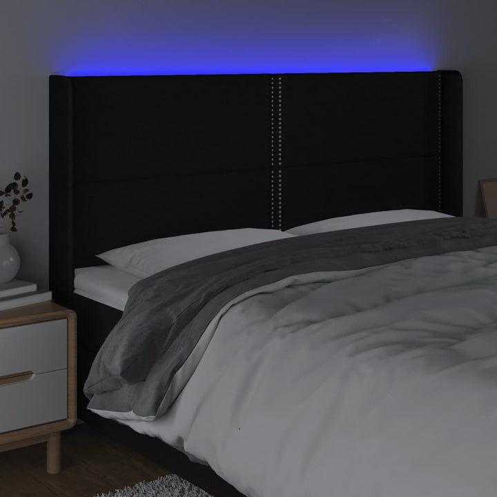 sengegavl med LED-lys 203x16x118/128 cm stof sort