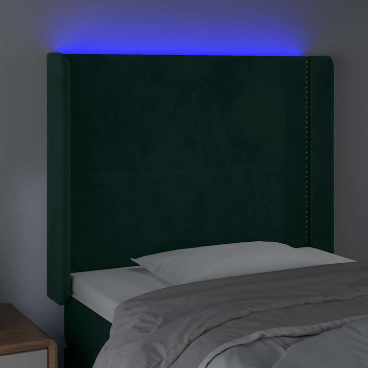 sengegavl med LED-lys 93x16x118/128 cm fløjl mørkegrøn