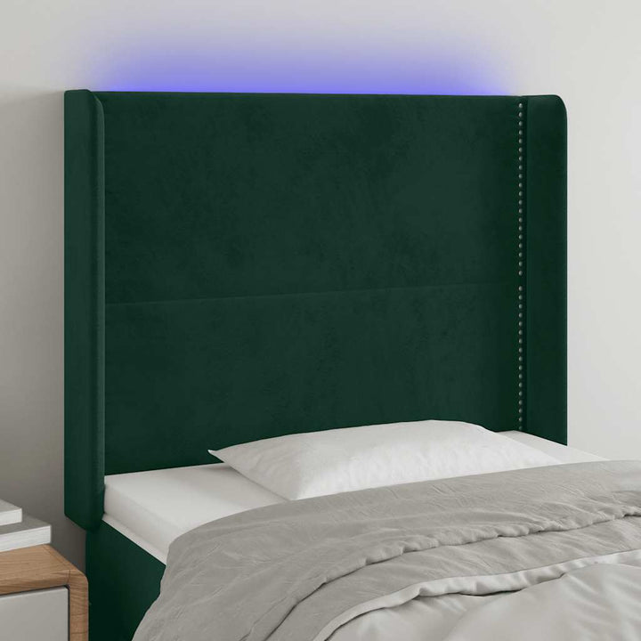sengegavl med LED-lys 93x16x118/128 cm fløjl mørkegrøn