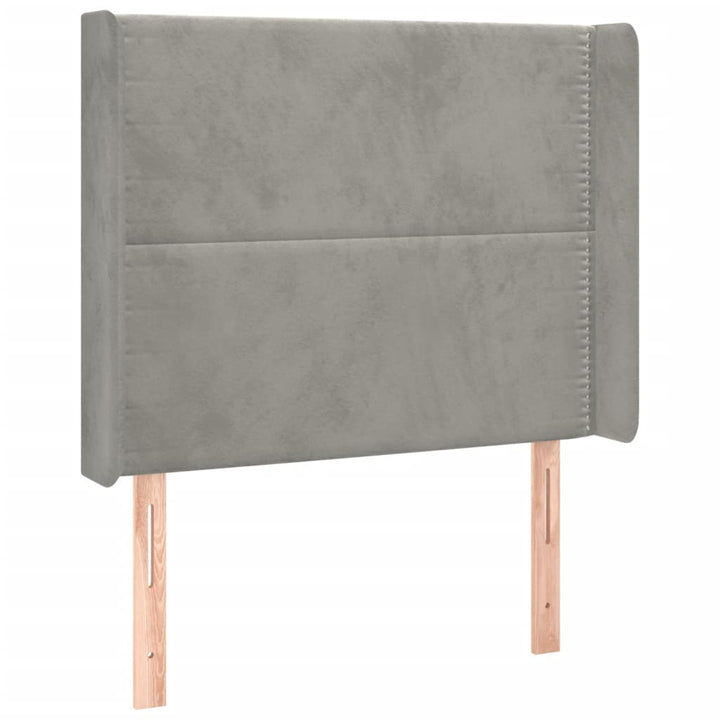 sengegavl med LED-lys 103x16x118/128 cm fløjl lysegrå