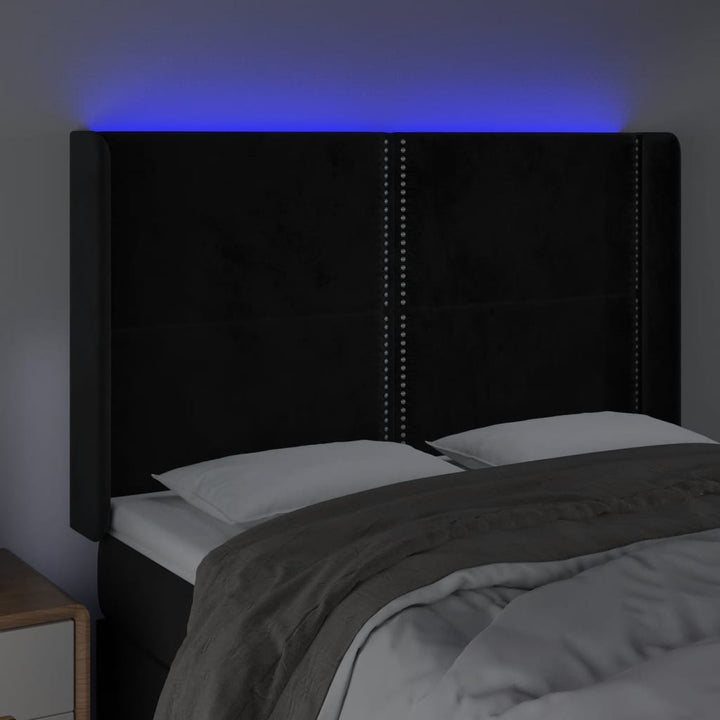 sengegavl med LED-lys 147x16x118/128 cm fløjl sort