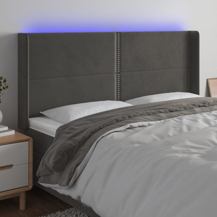 sengegavl med LED-lys 163x16x118/128 cm fløjl mørkegrå