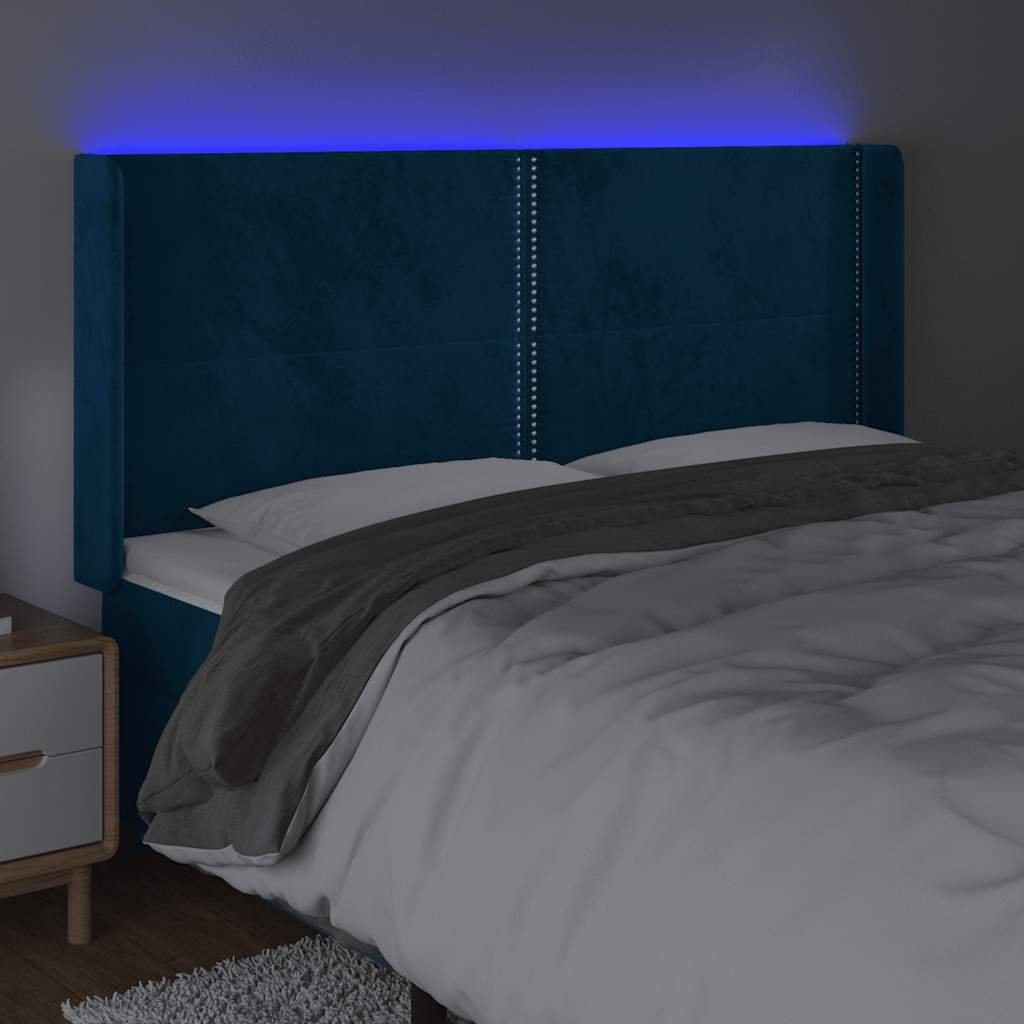 sengegavl med LED-lys 163x16x118/128 cm fløjl mørkeblå