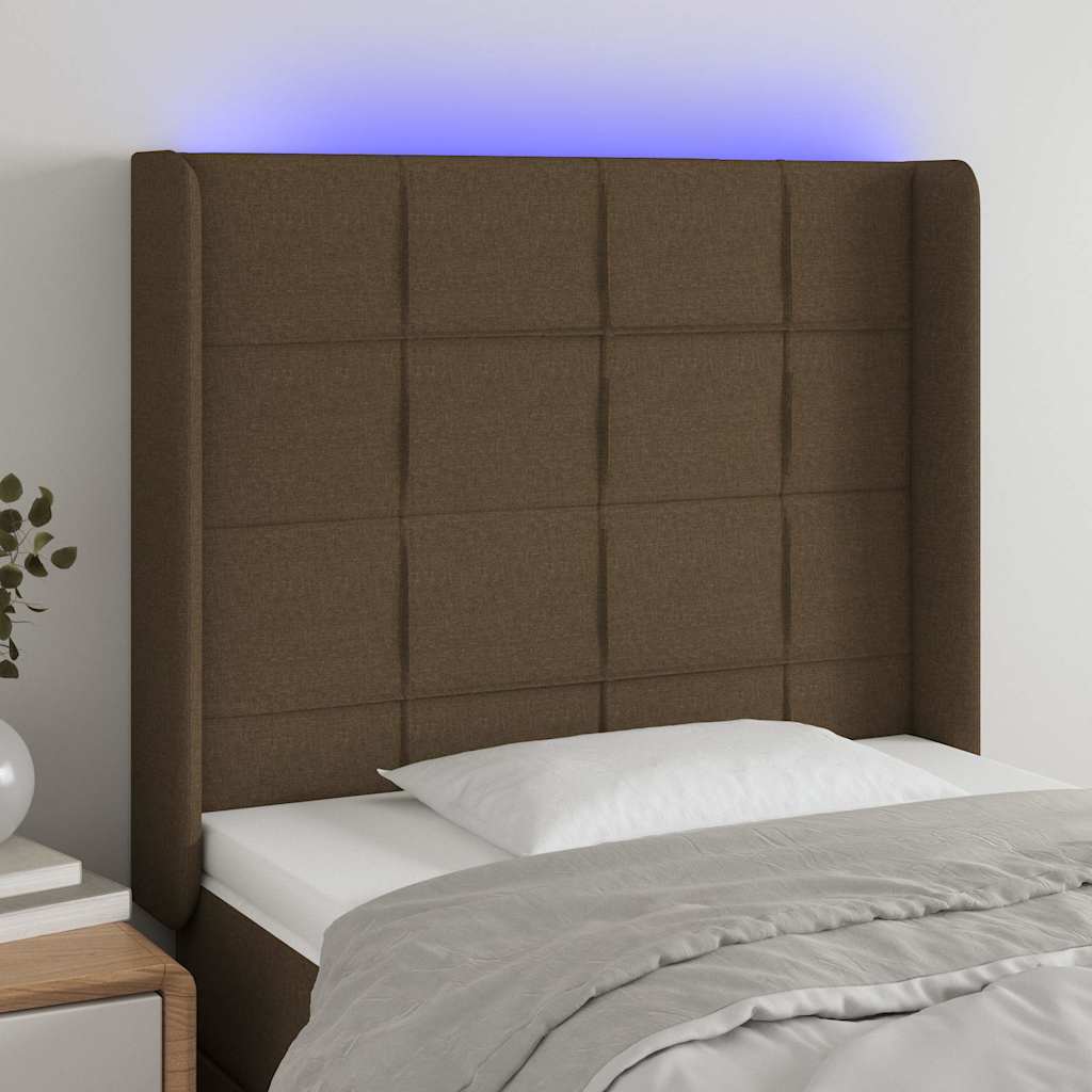sengegavl med LED-lys 83x16x118/128 cm stof mørkebrun