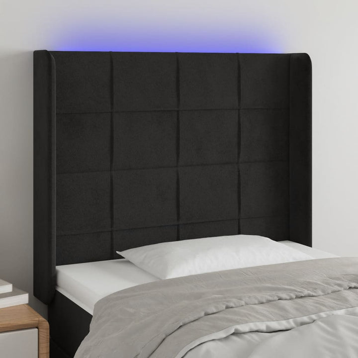 sengegavl med LED-lys 83x16x118/128 cm fløjl sort