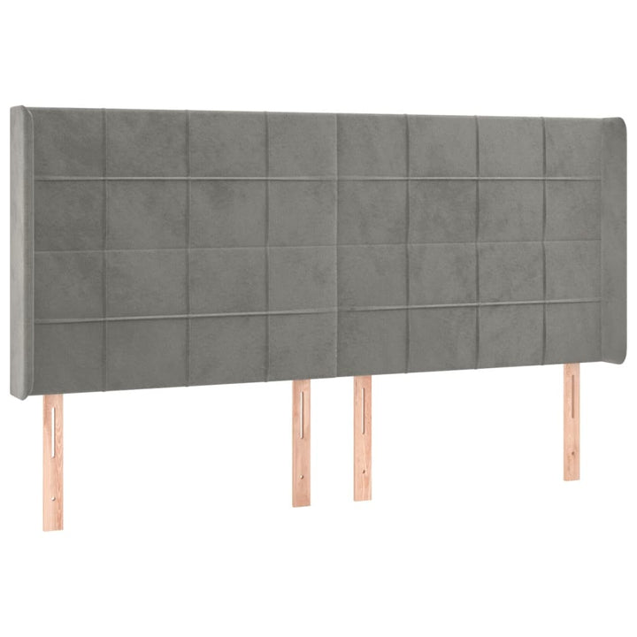 sengegavl med LED-lys 163x16x118/128 cm fløjl lysegrå