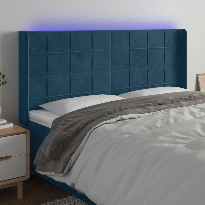 sengegavl med LED-lys 203x16x118/128 cm fløjl mørkeblå