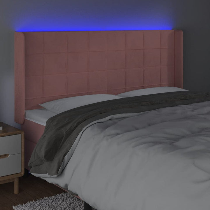 sengegavl med LED-lys 203x16x118/128 cm fløjl lyserød