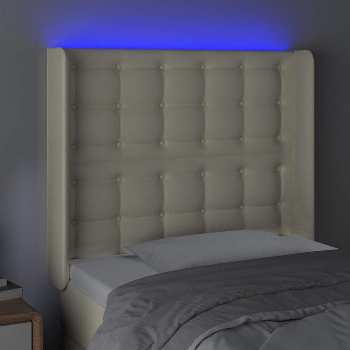 sengegavl med LED-lys 103x16x118/128 cm kunstlæder cremefarvet