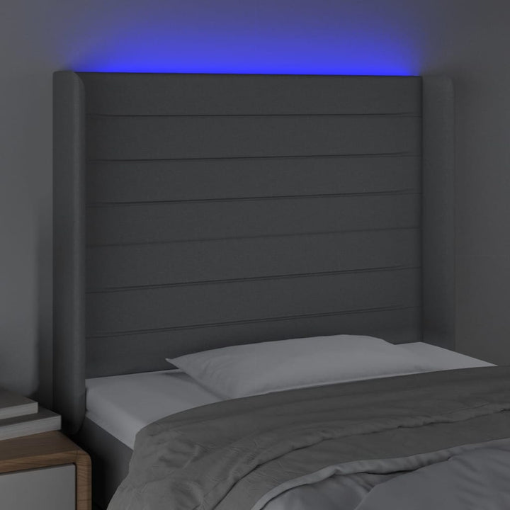 sengegavl med LED-lys 103x16x118/128 cm stof lysegrå