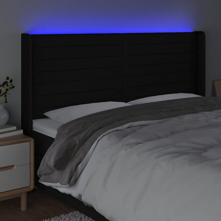 sengegavl med LED-lys 163x16x118/128 cm stof sort