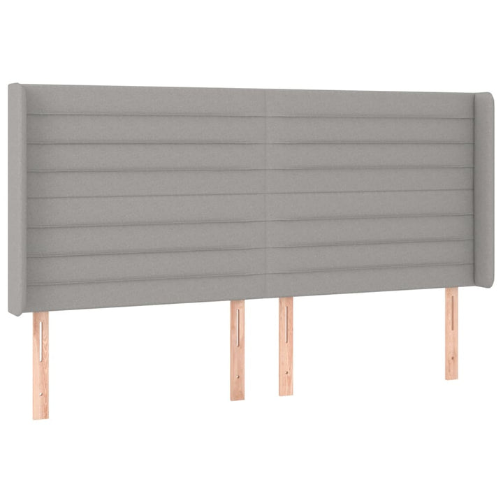 sengegavl med LED-lys 183x16x118/128 cm stof lysegrå