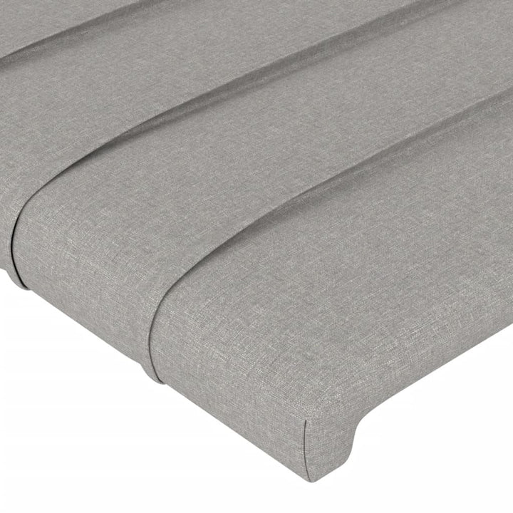 sengegavl med LED-lys 203x16x118/128 cm stof lysegrå