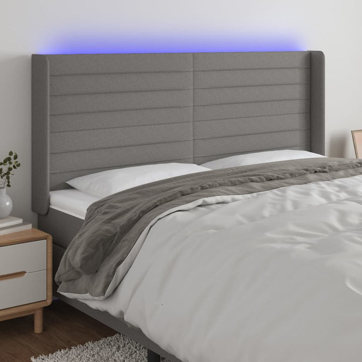 sengegavl med LED-lys 203x16x118/128 cm stof mørkegrå