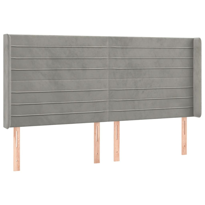 sengegavl med LED-lys 163x16x118/128 cm fløjl lysegrå