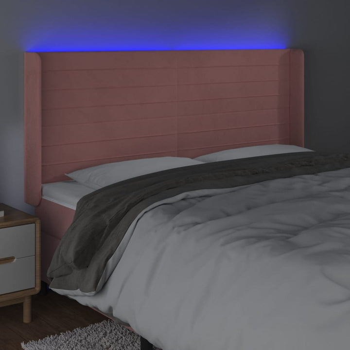 sengegavl med LED-lys 163x16x118/128 cm fløjl lyserød