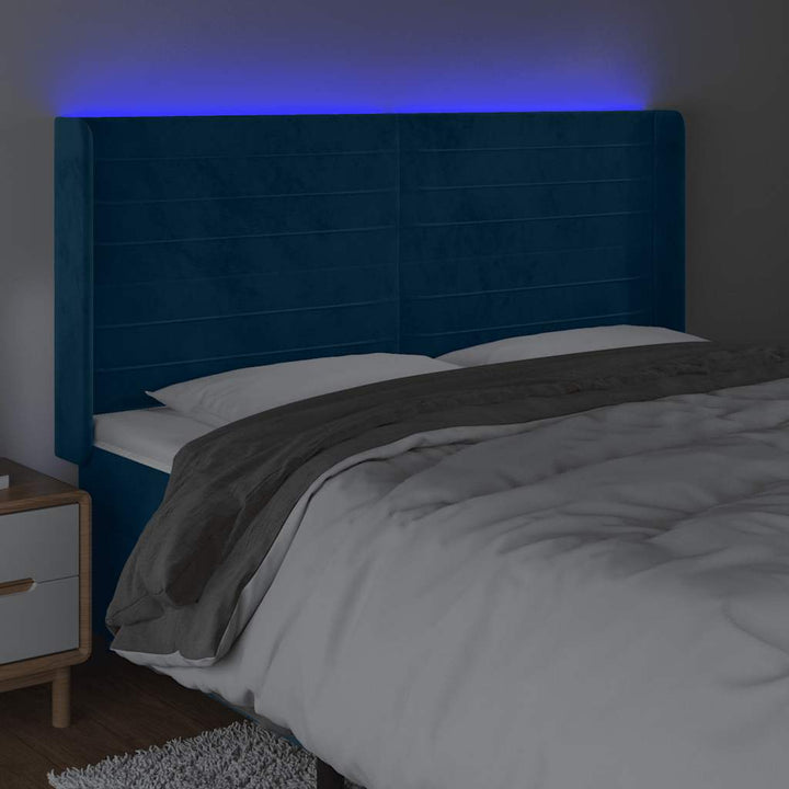 sengegavl med LED-lys 183x16x118/128 cm fløjl mørkeblå