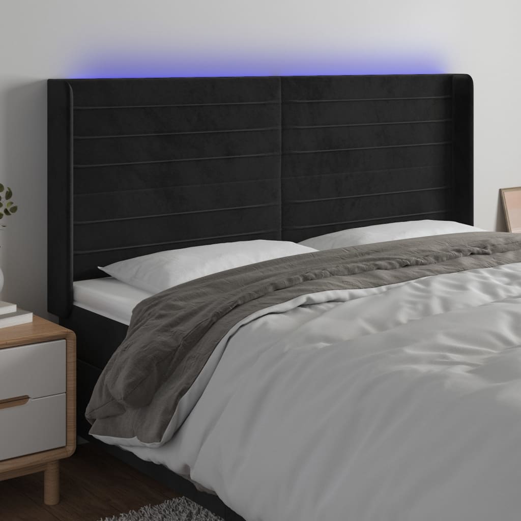 sengegavl med LED-lys 203x16x118/128 cm fløjl sort