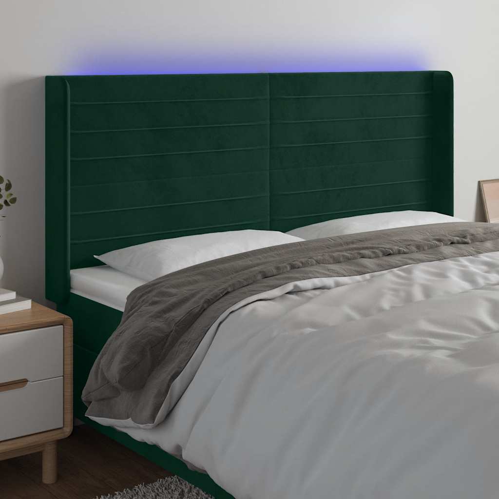sengegavl med LED-lys 203x16x118/128 cm fløjl mørkegrøn